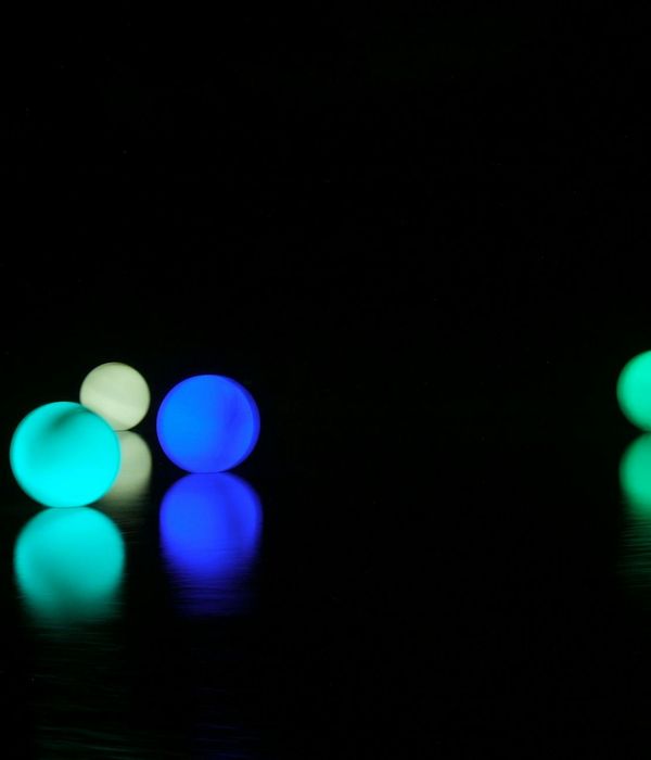 Abstract glowing geometric shapes in dark space environment
